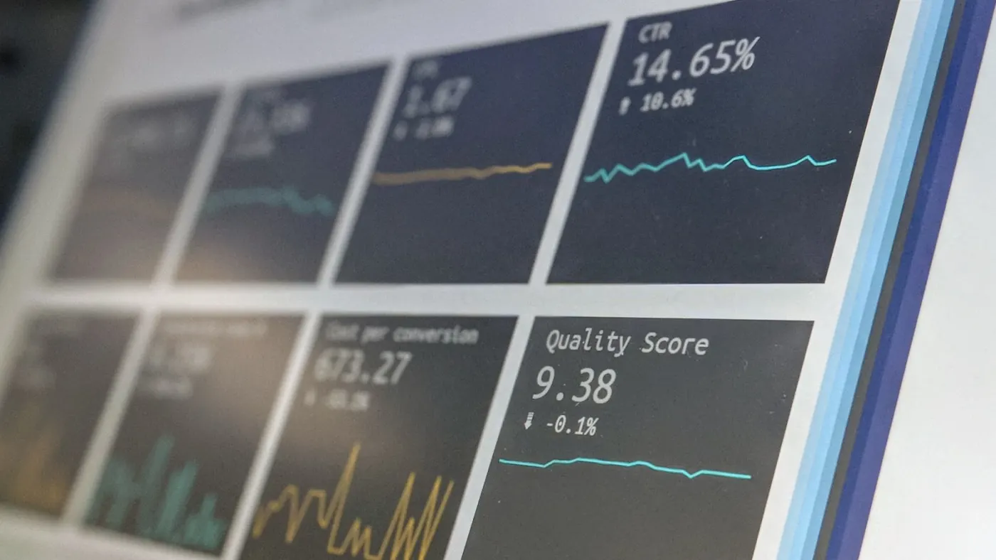 Analytics dashboard displaying real-time restaurant performance metrics with cyan data visualizations on dark interface