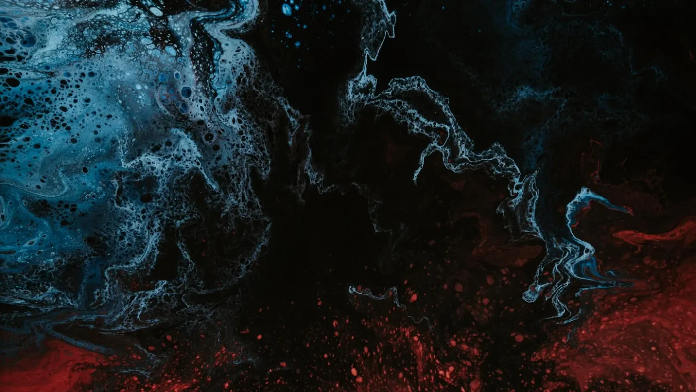 Abstract dark fluid art with flowing cyan and blue tones merging on black background representing seamless digital-to-human service transition